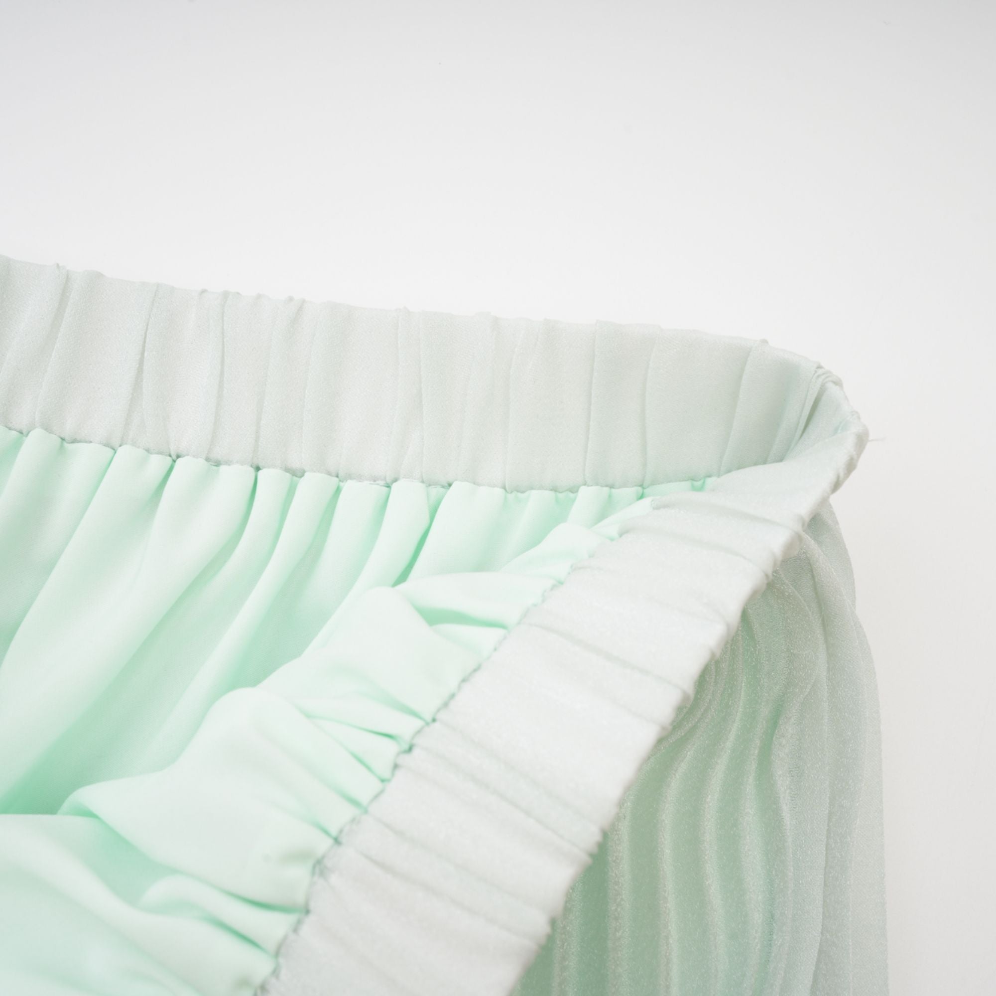 Σετ Ασορτί Πλισέ Τοπ Και Φούστα Fabrizia Με Ψεύτικα Λουλούδια